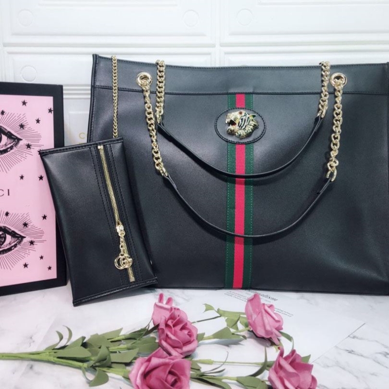 G*u*i shopping bags
